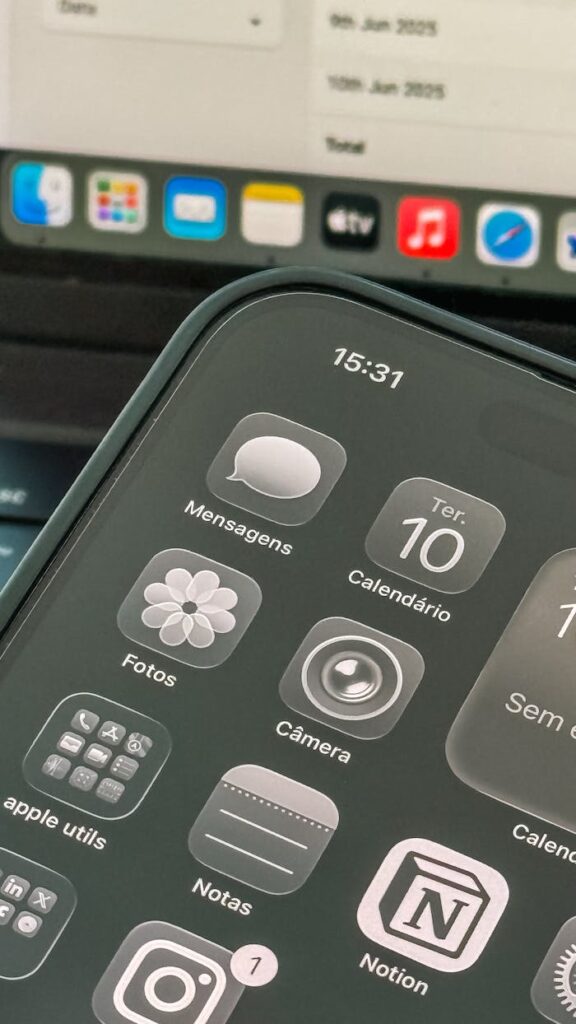 Close-up shot of a smartphone displaying apps and calendar on the screen.
